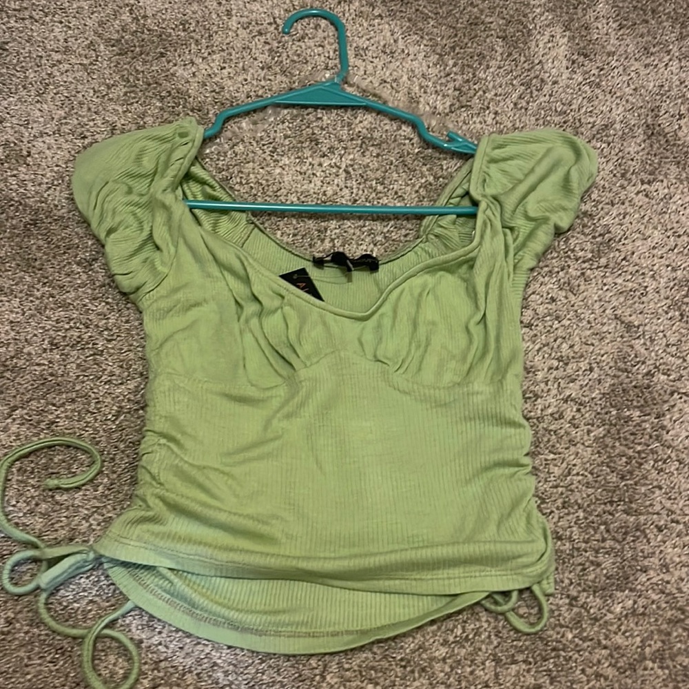 never worn francesca’s top size L